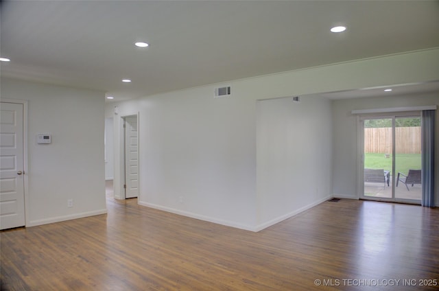 3634 S Pittsburg Ave, Tulsa, OK 74135 - empty room with recessed lighting and wood finished floors