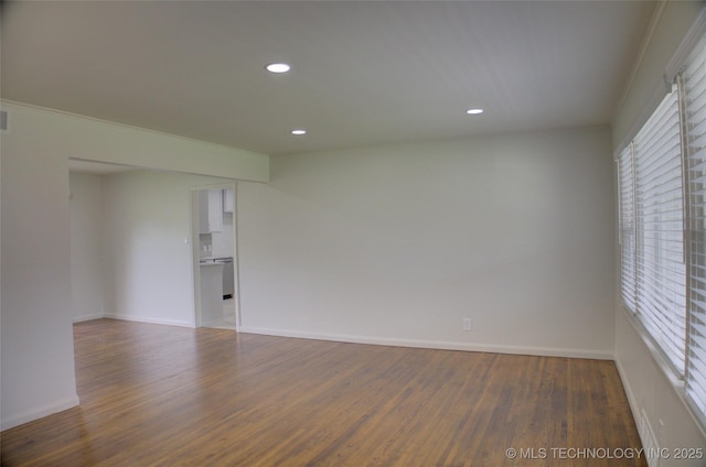 3634 S Pittsburg Ave, Tulsa, OK 74135 - unfurnished room featuring wood finished floors and recessed lighting