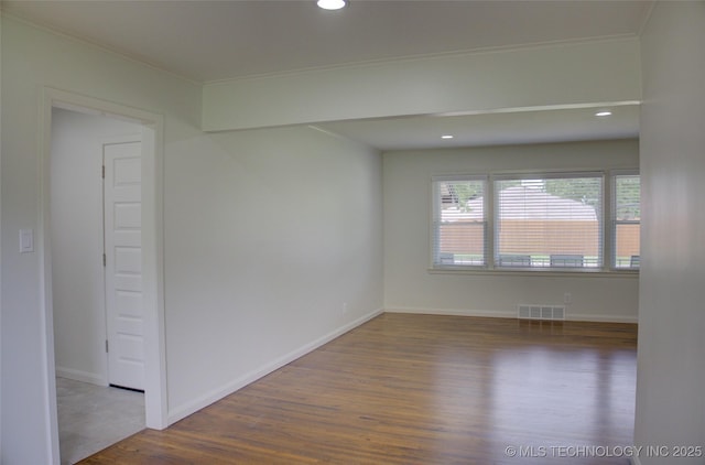3634 S Pittsburg Ave, Tulsa, OK 74135 - unfurnished room featuring wood finished floors, crown molding, and recessed lighting