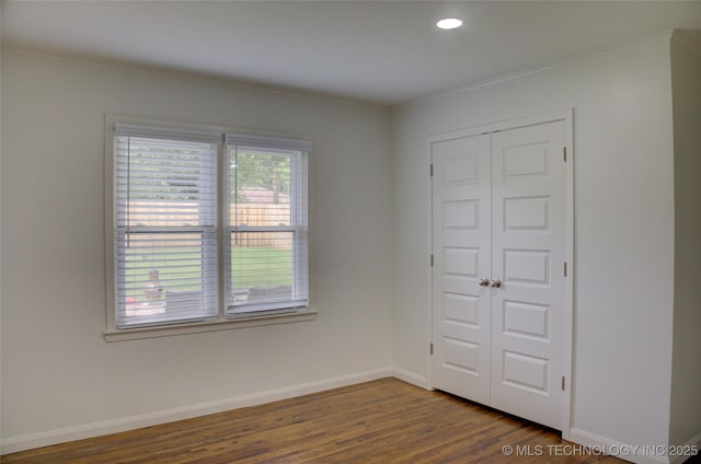 3634 S Pittsburg Ave, Tulsa, OK 74135 - unfurnished room with crown molding, dark wood finished floors, and recessed lighting