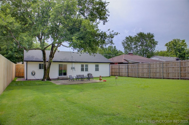 3634 S Pittsburg Ave, Tulsa, OK 74135 - rear view of property featuring a fenced backyard, a patio, and a shingled roof