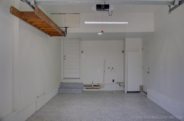 3634 S Pittsburg Ave, Tulsa, OK 74135 - garage featuring a garage door opener