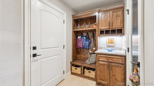 7920 N 147th E Ave, Owasso, OK 74055 - mudroom featuring light tile patterned floors