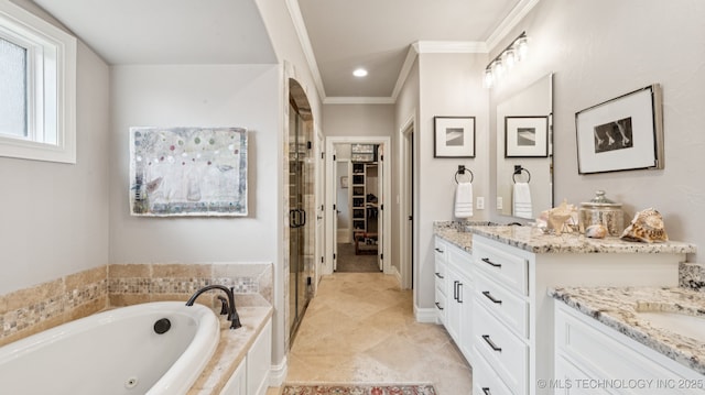7920 N 147th E Ave, Owasso, OK 74055 - bathroom with vanity, a stall shower, crown molding, a jetted tub, and a spacious closet