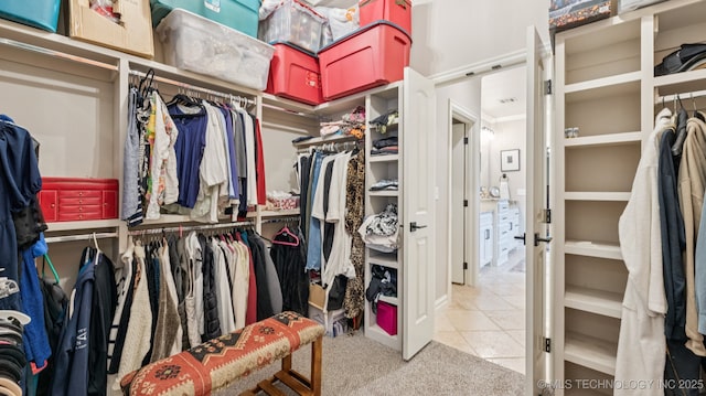7920 N 147th E Ave, Owasso, OK 74055 - walk in closet featuring carpet flooring and tile patterned flooring