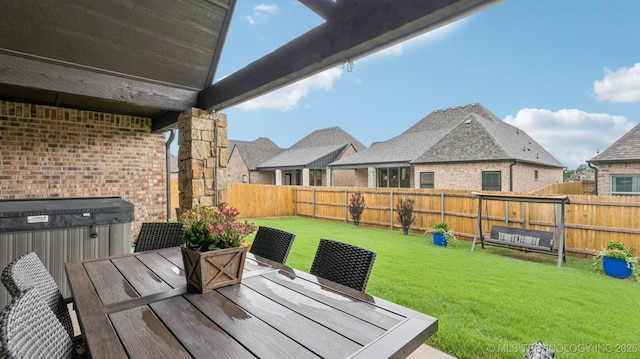 7920 N 147th E Ave, Owasso, OK 74055 - fenced backyard with outdoor dining area and a residential view