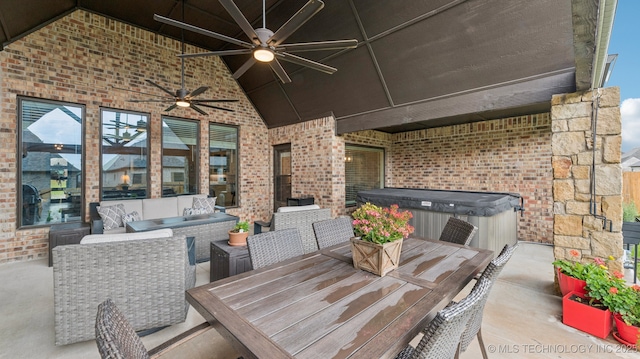 7920 N 147th E Ave, Owasso, OK 74055 - view of patio featuring a hot tub, outdoor dining area, and a ceiling fan