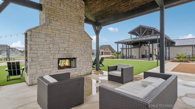 7920 N 147th E Ave, Owasso, OK 74055 - view of patio / terrace with a gazebo and an outdoor living space with a fireplace