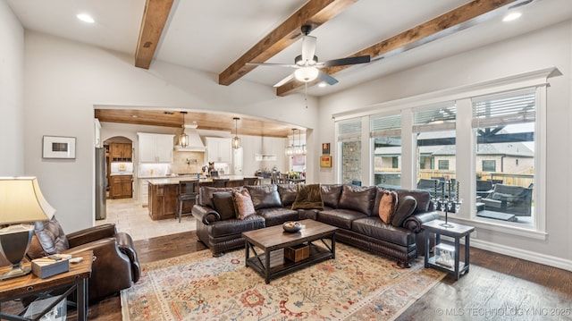 7920 N 147th E Ave, Owasso, OK 74055 - living room featuring light wood-style floors, a ceiling fan, recessed lighting, and beamed ceiling