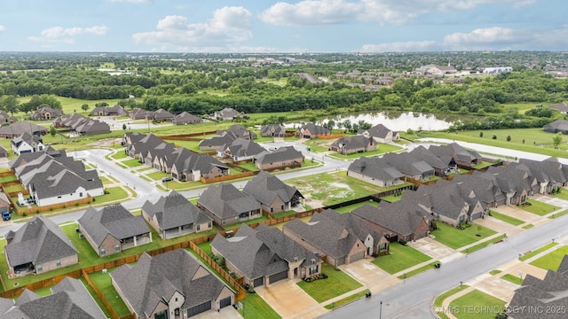 7920 N 147th E Ave, Owasso, OK 74055 - aerial view of residential area with a large body of water