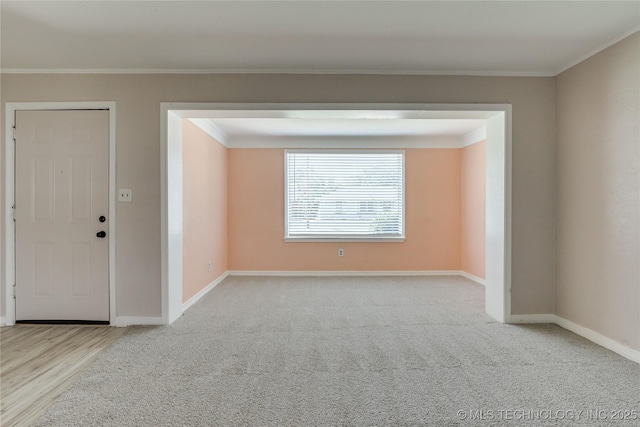 1417 Downing St, Oklahoma City, OK 73120 - carpeted spare room with crown molding and wood finished floors