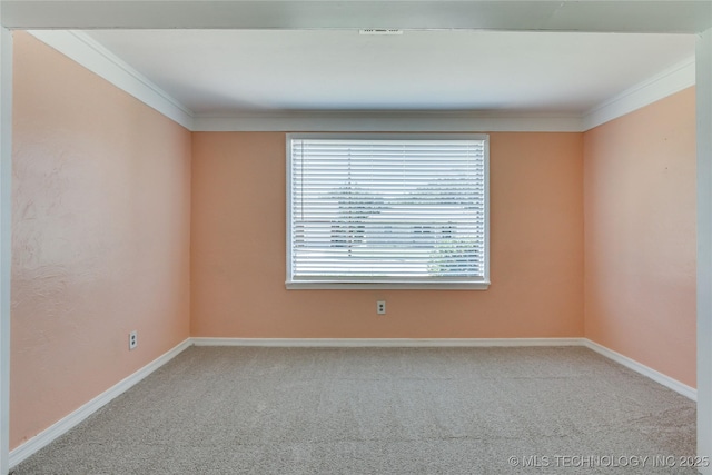 1417 Downing St, Oklahoma City, OK 73120 - spare room featuring ornamental molding and carpet flooring