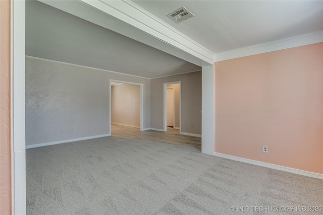 1417 Downing St, Oklahoma City, OK 73120 - spare room with carpet floors and crown molding