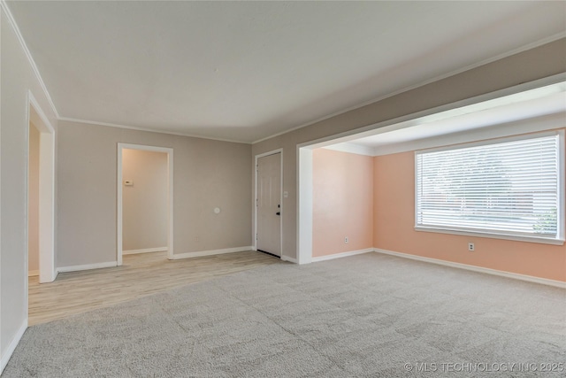 1417 Downing St, Oklahoma City, OK 73120 - spare room with light carpet and ornamental molding