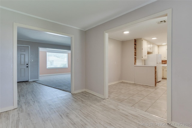 1417 Downing St, Oklahoma City, OK 73120 - empty room featuring ornamental molding and light wood-type flooring