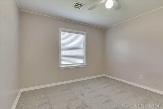 1417 Downing St, Oklahoma City, OK 73120 - spare room with carpet flooring, ceiling fan, and ornamental molding