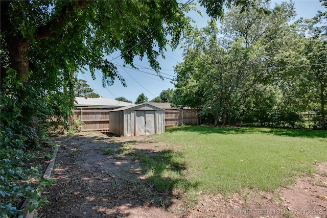 1417 Downing St, Oklahoma City, OK 73120 - fenced backyard with a shed