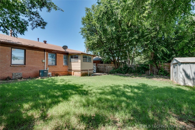 1417 Downing St, Oklahoma City, OK 73120 - fenced backyard with a shed