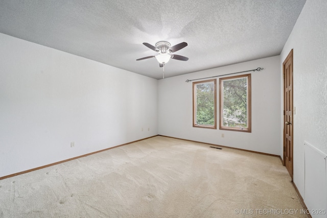 3334 E 100th Pl, Tulsa, OK 74137 - empty room with light colored carpet, a ceiling fan, and a textured ceiling