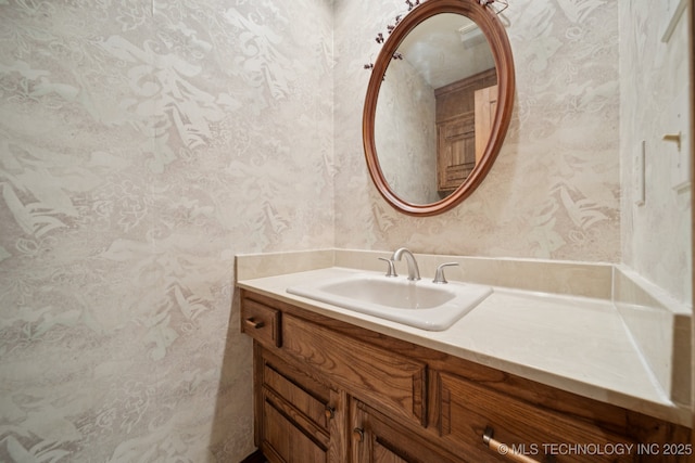 3334 E 100th Pl, Tulsa, OK 74137 - bathroom with wallpapered walls and vanity