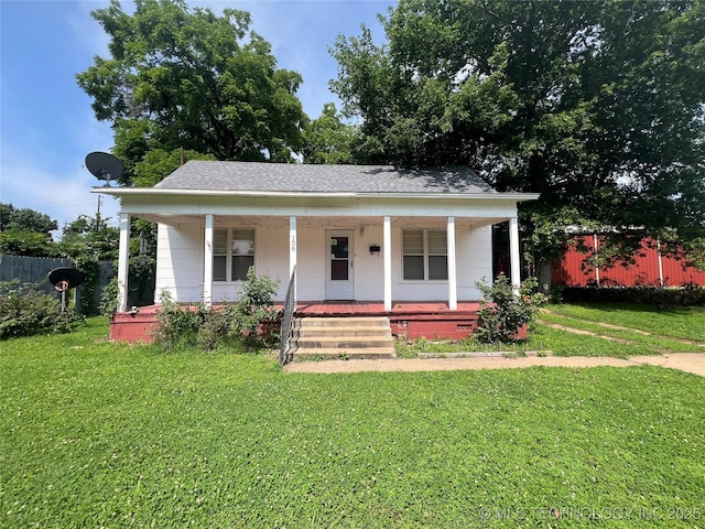 106 N Jordan St, Cleveland, OK 74020 - bungalow-style house featuring a porch and a shingled roof