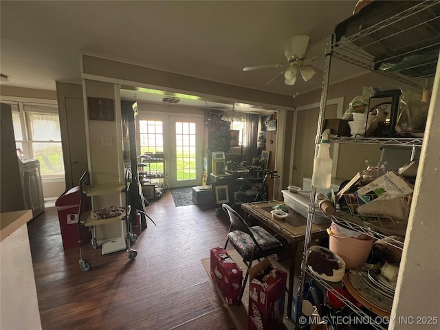 106 N Jordan St, Cleveland, OK 74020 - living area featuring wood finished floors, a ceiling fan, plenty of natural light, and french doors