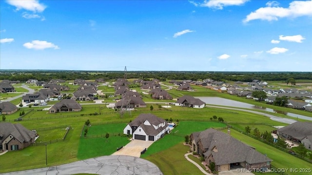 7107 E 88th St N, Owasso, OK 74055 - aerial perspective of suburban area with a nearby body of water
