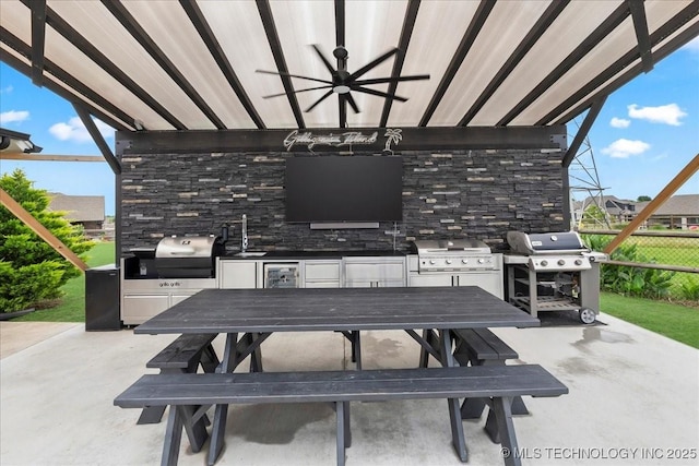 7107 E 88th St N, Owasso, OK 74055 - view of patio featuring area for grilling, outdoor dining space, and ceiling fan