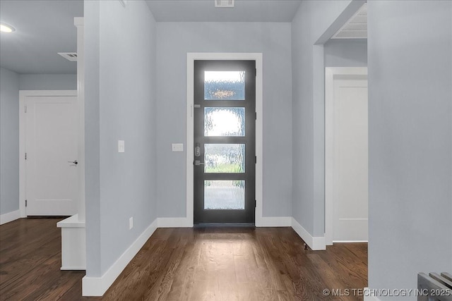 7107 E 88th St N, Owasso, OK 74055 - foyer featuring dark wood-style flooring