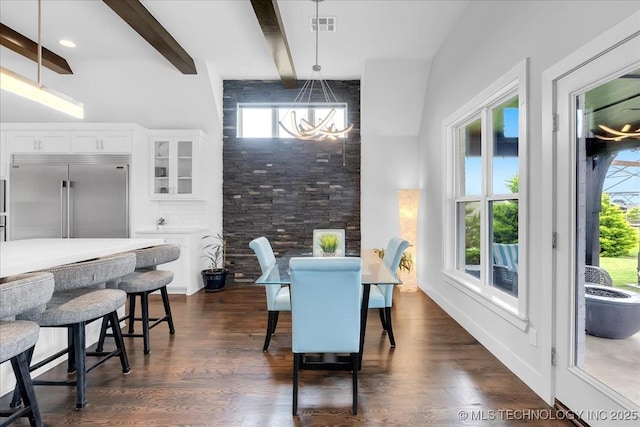 7107 E 88th St N, Owasso, OK 74055 - dining space featuring a chandelier, dark wood-style flooring, beamed ceiling, and healthy amount of natural light
