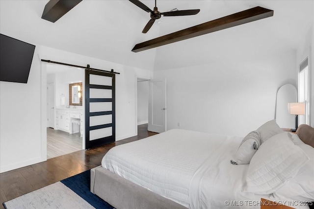 7107 E 88th St N, Owasso, OK 74055 - bedroom featuring a barn door, wood finished floors, ensuite bathroom, and ceiling fan