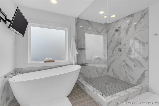 7107 E 88th St N, Owasso, OK 74055 - full bathroom with a freestanding tub, plenty of natural light, a marble finish shower, and recessed lighting