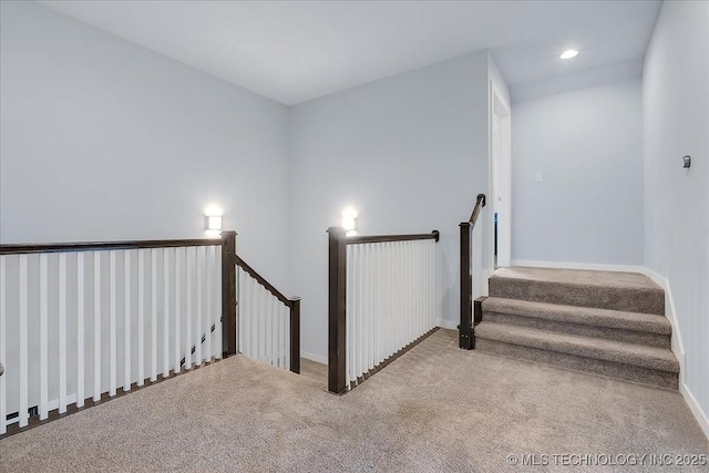 7107 E 88th St N, Owasso, OK 74055 - stairs featuring carpet floors and recessed lighting