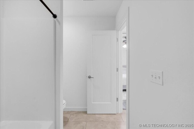 7107 E 88th St N, Owasso, OK 74055 - hallway with light tile patterned flooring