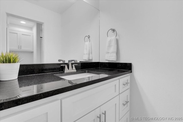7107 E 88th St N, Owasso, OK 74055 - bathroom with vanity and recessed lighting