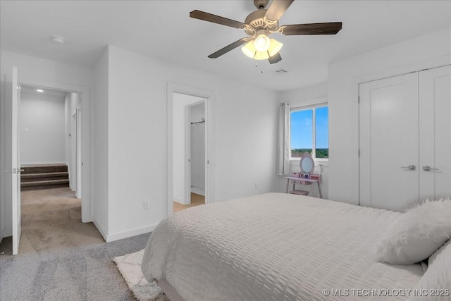 7107 E 88th St N, Owasso, OK 74055 - carpeted bedroom with a closet and a ceiling fan