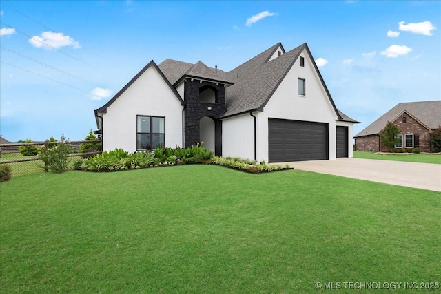 7107 E 88th St N, Owasso, OK 74055 - french country inspired facade with a garage, stucco siding, roof with shingles, driveway, and stone siding