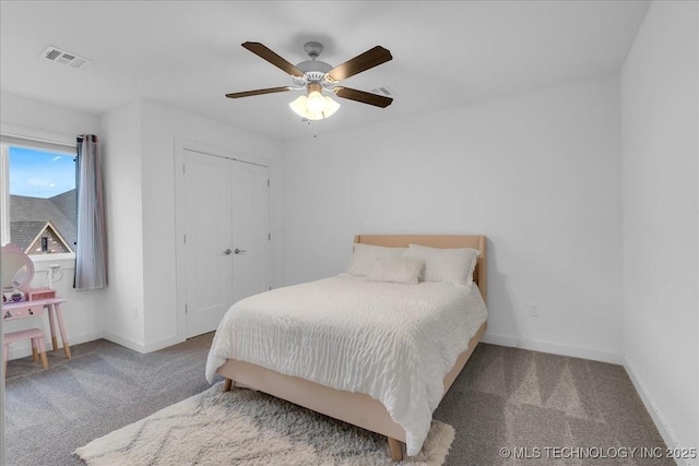 7107 E 88th St N, Owasso, OK 74055 - carpeted bedroom featuring a ceiling fan and a closet