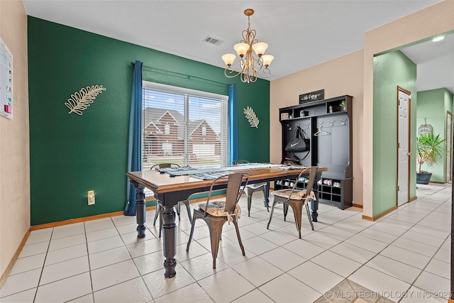 1507 Southern Hills Dr, Ardmore, OK 73401 - dining area with a chandelier and light tile patterned flooring