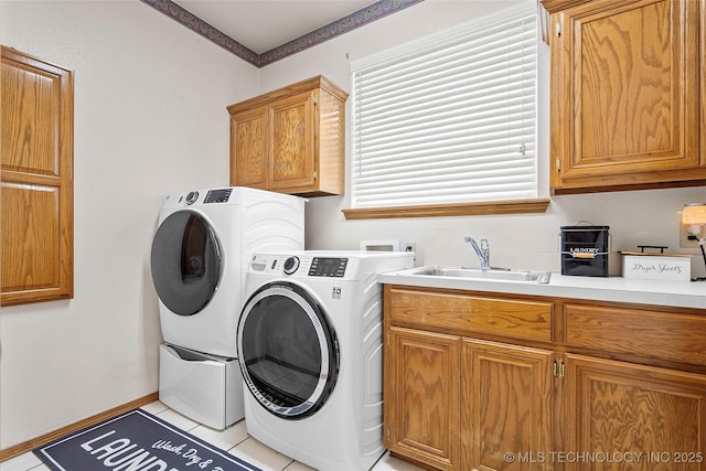 1507 Southern Hills Dr, Ardmore, OK 73401 - laundry room with cabinet space, separate washer and dryer, and light tile patterned floors
