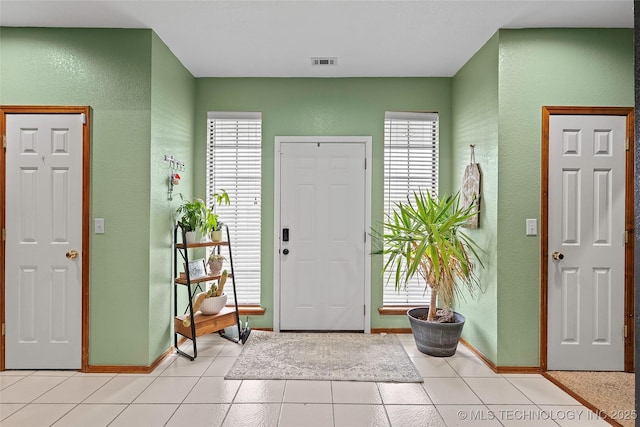 1507 Southern Hills Dr, Ardmore, OK 73401 - foyer featuring a textured wall and light tile patterned floors
