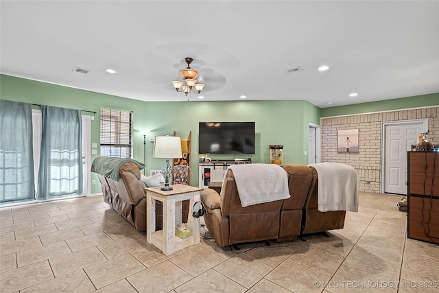 1507 Southern Hills Dr, Ardmore, OK 73401 - living room with light tile patterned flooring, a ceiling fan, and recessed lighting
