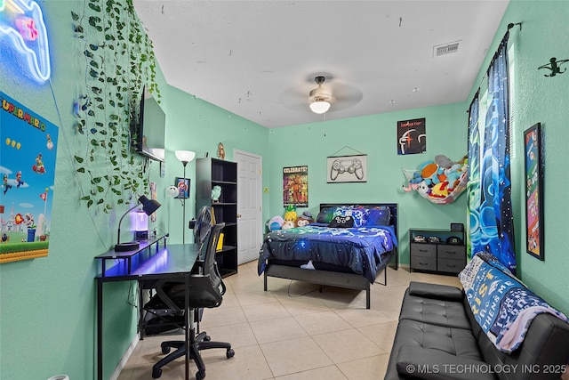 1507 Southern Hills Dr, Ardmore, OK 73401 - tiled bedroom with a desk and a ceiling fan