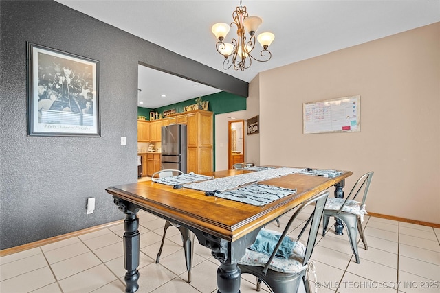 1507 Southern Hills Dr, Ardmore, OK 73401 - dining room featuring a chandelier, light tile patterned floors, and a textured wall