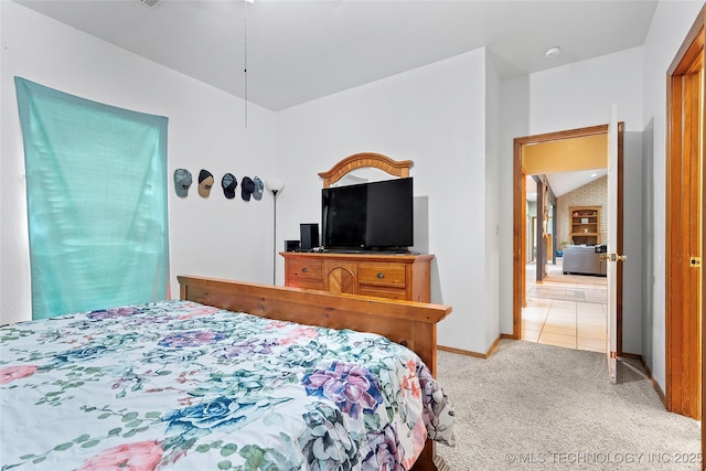 1507 Southern Hills Dr, Ardmore, OK 73401 - bedroom featuring light colored carpet and vaulted ceiling