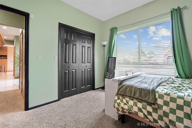 1507 Southern Hills Dr, Ardmore, OK 73401 - bedroom featuring carpet floors and a closet