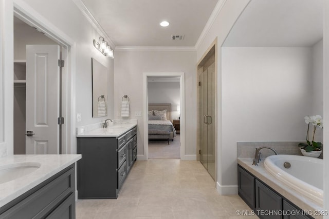 2833 E 142nd St S, Bixby, OK 74008 - bathroom with two vanities, a garden tub, a stall shower, crown molding, and ensuite bath