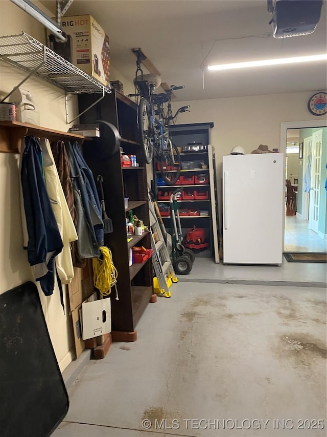 738 S Norfolk Ave, Tulsa, OK 74120 - garage featuring freestanding refrigerator