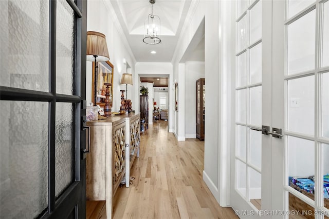 5314 E 126th St S, Bixby, OK 74008 - hall with ornamental molding, light wood-type flooring, a chandelier, and french doors