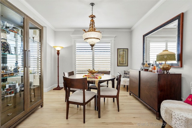 5314 E 126th St S, Bixby, OK 74008 - dining room featuring light wood finished floors, healthy amount of natural light, and crown molding